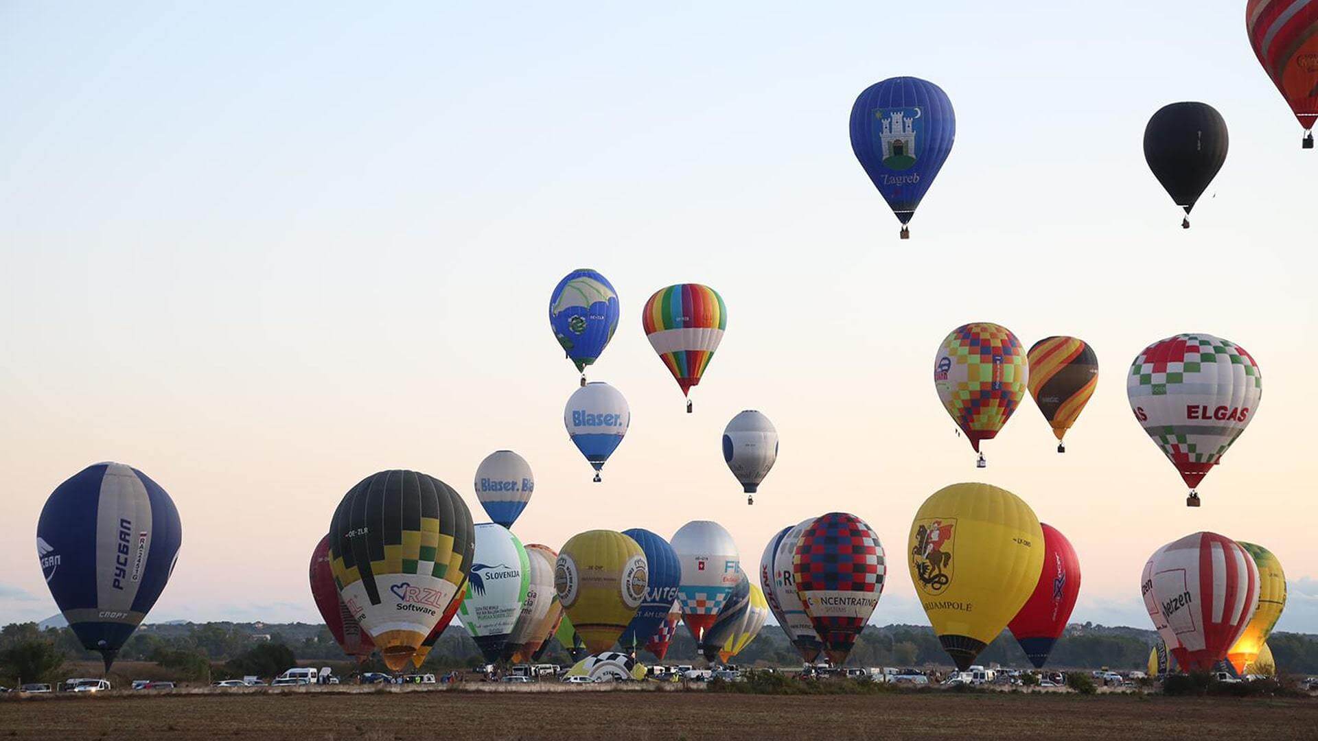 Balloons taking off from Malllorca field during the championships min