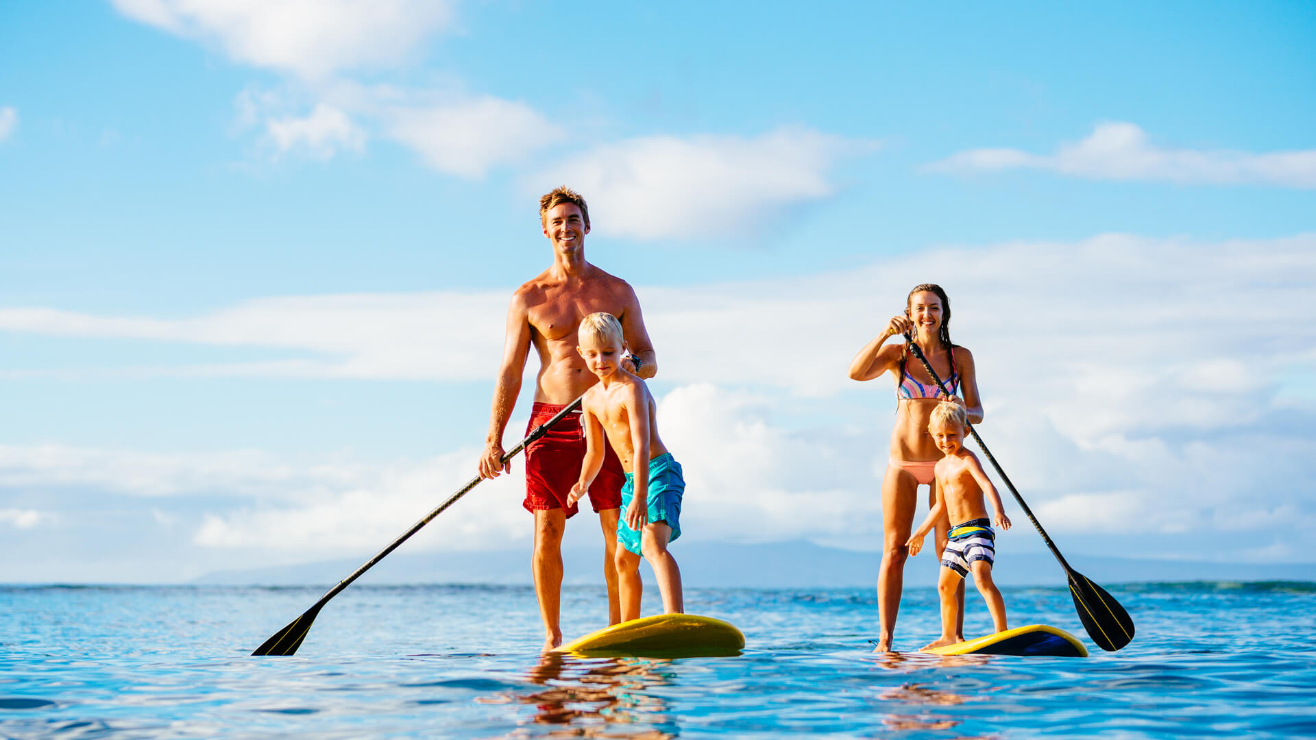 Family paddle boarding