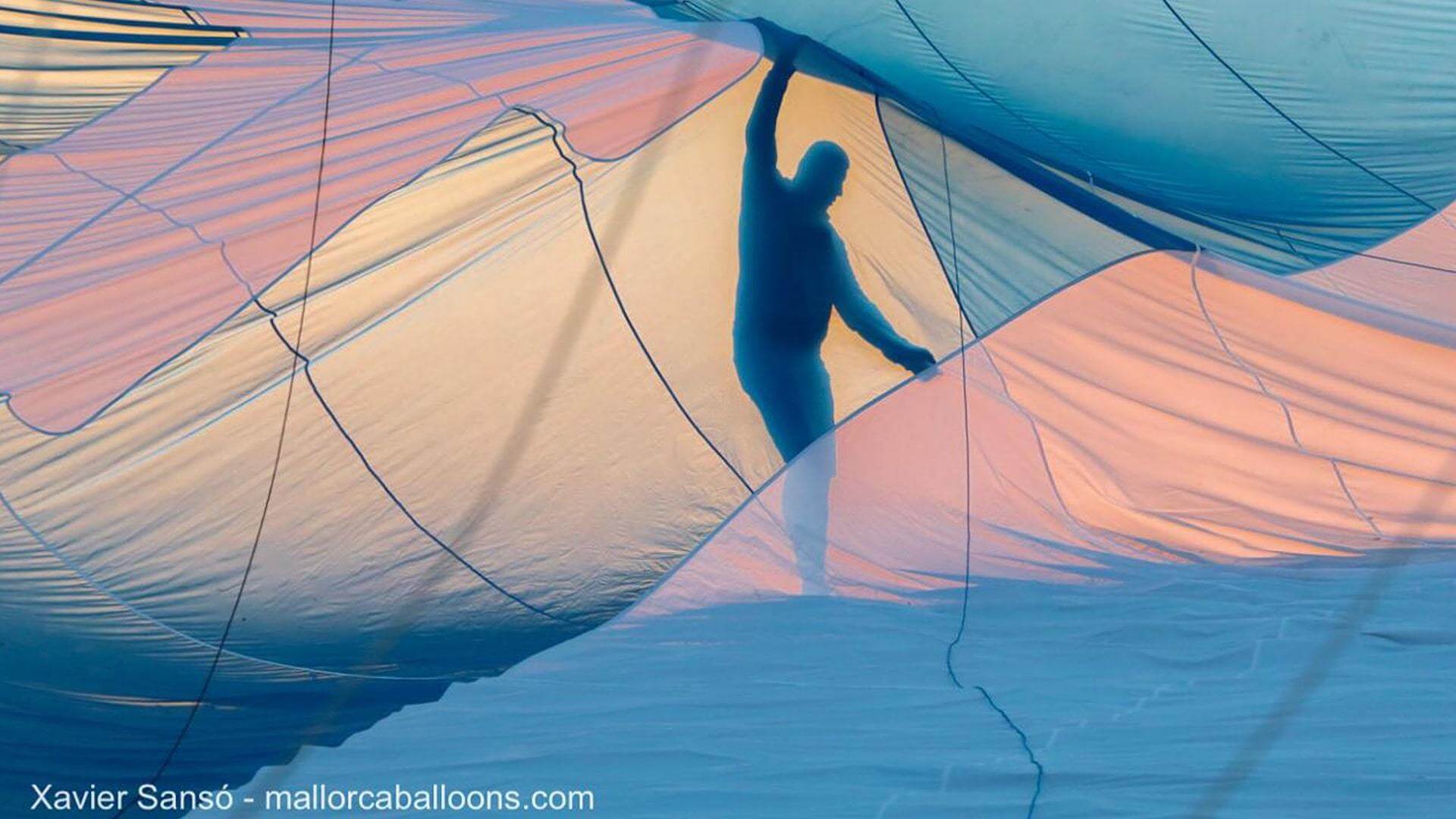 Silhouette man in hot air balloon mallorca hot air balloons european chamipionships min